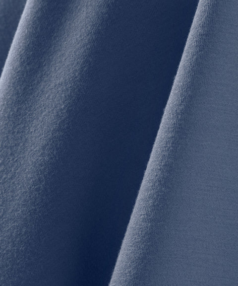 Close-up of draped Tidal Blue sandwashed fabric on Sandwash Crewneck