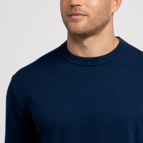 Man in Anytime Crewneck Sweater in Deep Blue lifestyle shot