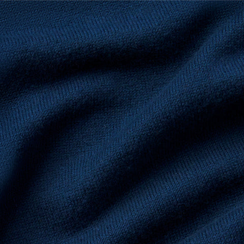 Lifestyle shot of the Anytime Crewneck Sweater in Deep Blue