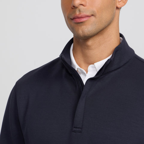 The Sandwash Quarter-Zip in Deep Blue folded on a light background
