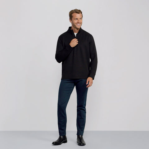 The Sandwash Quarter-Zip True Black shown from the side on a model