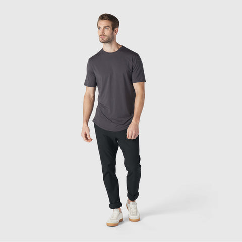 A man wearing the Anytime Tee in Charcoal Gray