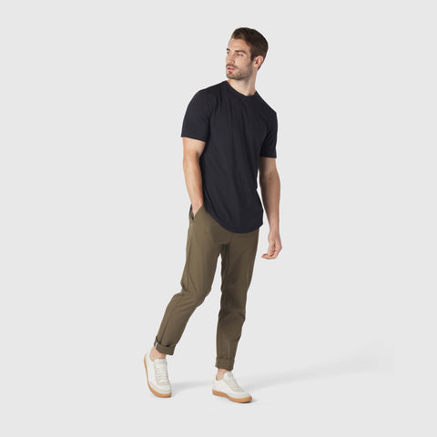 A man wearing the Anytime Tee in Deep Blue