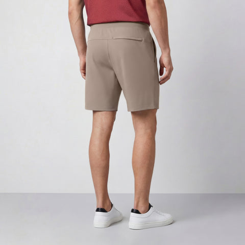 A man in the Atlas Short 8" in Desert Taupe outdoors