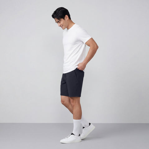 Man in the Atlas Short 8 inch Navy Blue in a casual environment