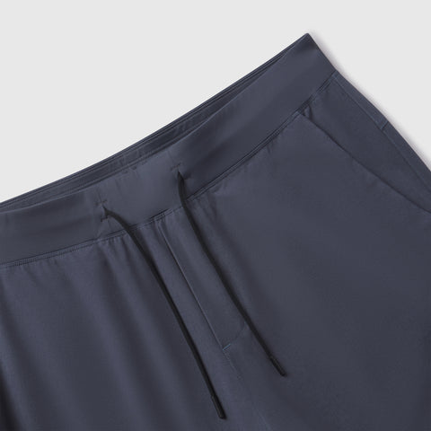The Atlas Short 8 inch Slate Blue worn in a casual lifestyle scene
