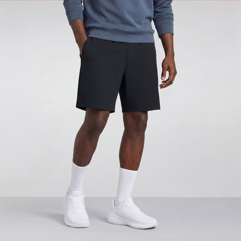 A man wearing the Atlas Short in True Black