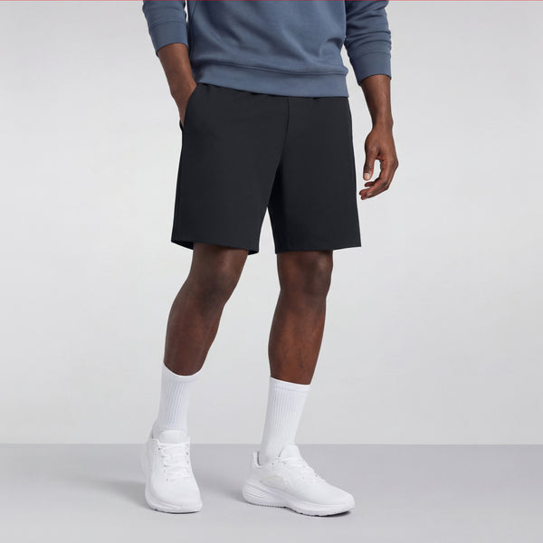A man wearing the Atlas Short in True Black