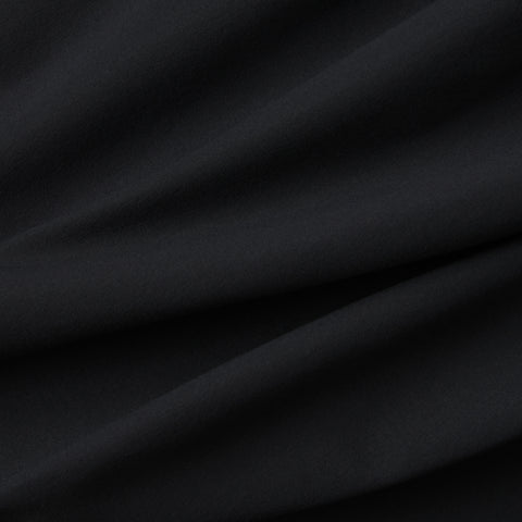 A man wearing the Atlas Short 8" in True Black