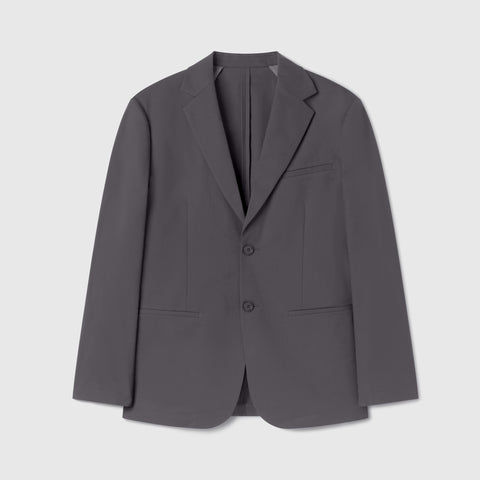 Man in the Jetsetter Blazer Charcoal Gray in an outdoor lifestyle shot