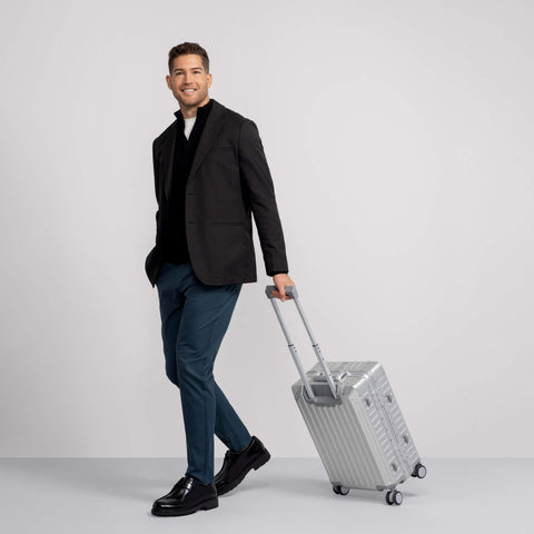 The Jetsetter Blazer True Black shown from the side on a model