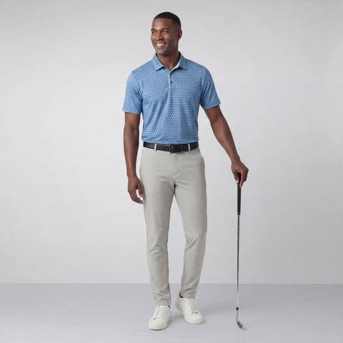 A man wearing the Clubhouse Performance Polo in Bering Sea Gridline