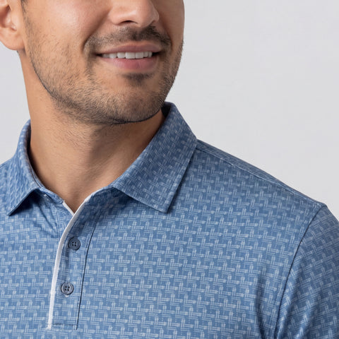 Man in Clubhouse Performance Polo in Bering Sea Gridline on golf course