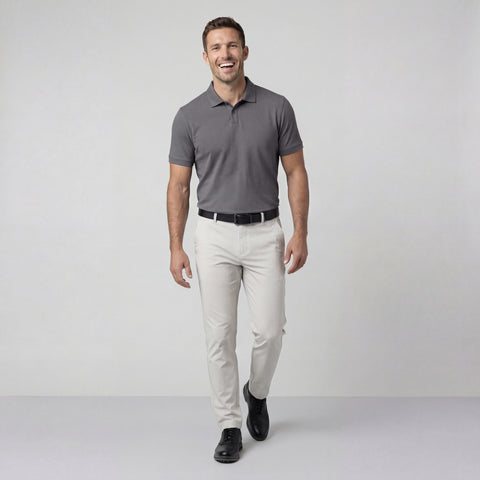 The Clubhouse Pique Polo in Charcoal Gray worn by a model