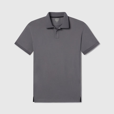 A man in the Clubhouse Pique Polo in Charcoal Gray outdoors