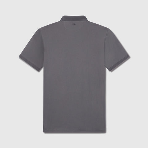 A man wearing the Clubhouse Pique Polo in Charcoal Gray