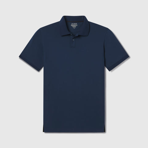 A man in the Clubhouse Pique Polo in Tidal Blue outdoors