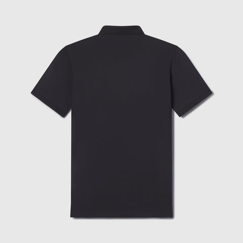 The Jack Archer Clubhouse Pique Polo in True Black is displayed from the back, showcasing its classic collar and short sleeves. The shirt has a clean, logo-free look and is laid flat on a white background for a sleek, comfortable style.