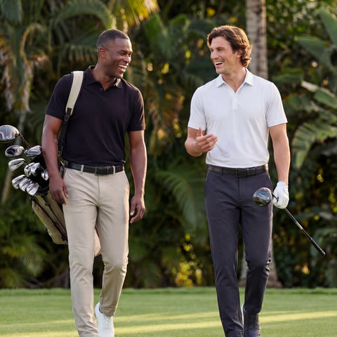 A man wearing the Clubhouse Pique Polo in True White outdoors.