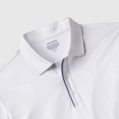 Detail view of the Clubhouse Performance Polo in White Driveline.