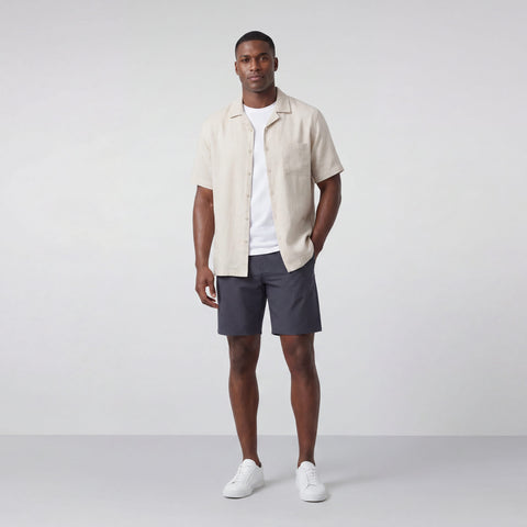 The Getaway Linen Shirt in Canvas worn by a model