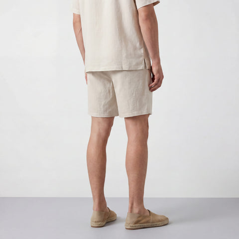 The Getaway Linen Short in Canvas in a lifestyle setting