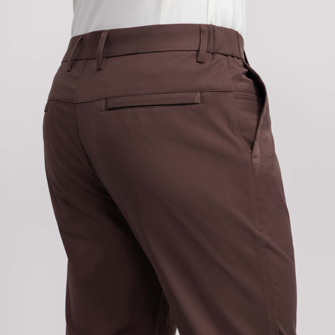 Back detail of the Jetsetter Tech Pant Slim Fit in Bourbon Brown.