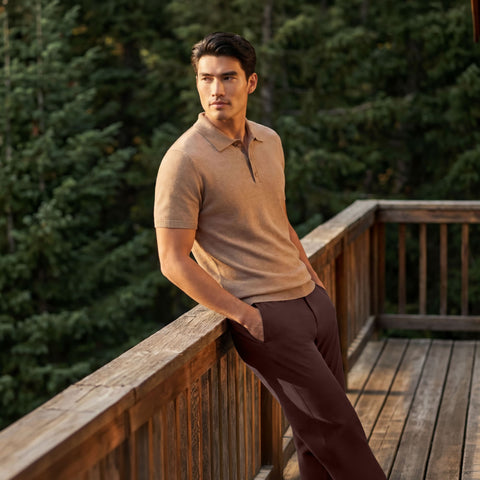 A man wearing the Jetsetter Tech Pant Slim Fit in Bourbon Brown