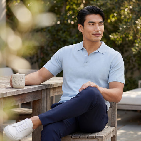 A man wearing the Jetsetter Tech Pant Straight Fit in Deep Blue