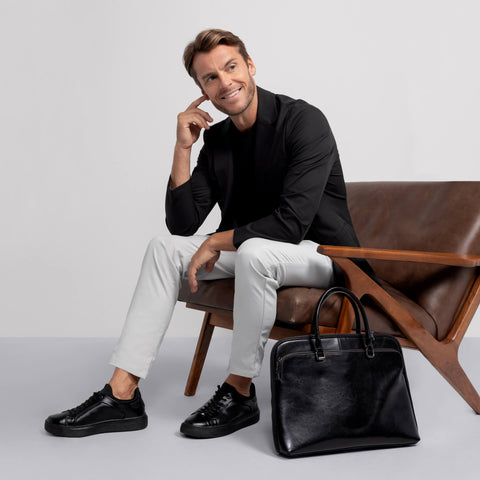 The Jetsetter Tech Pant Classic Fit in Ice Gray in a lifestyle setting.