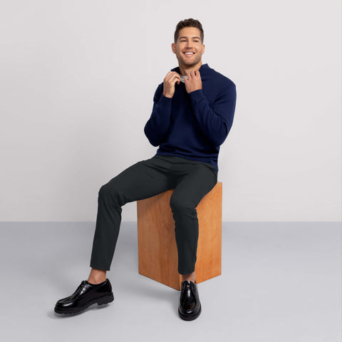 The Jetsetter Tech Pant Slim Fit in Space Black on a model.