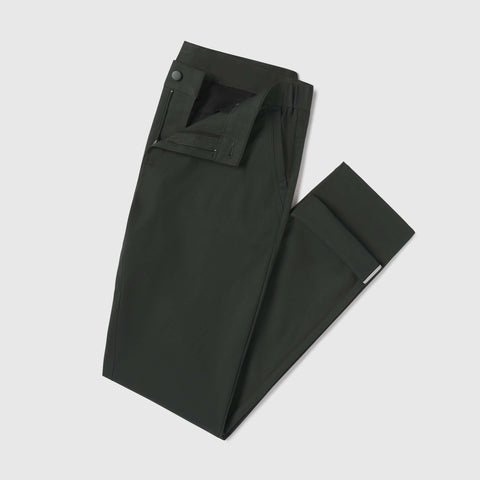 The Jetsetter Tech Pant Straight Fit in Spruce Green, folded on white background.