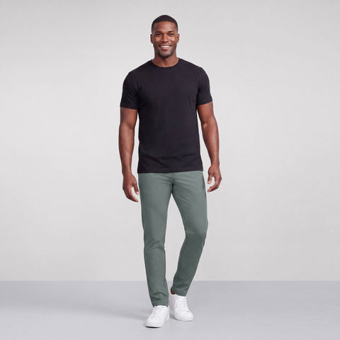 The Jetsetter Tech Pant Straight Fit in Storm Green worn in a lifestyle setting