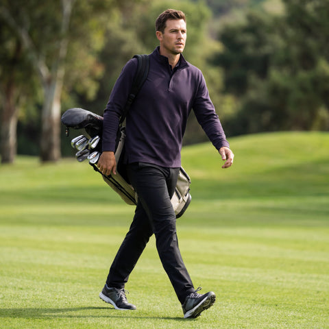 A man wearing the Jetsetter Tech Pant Slim Fit in True Black