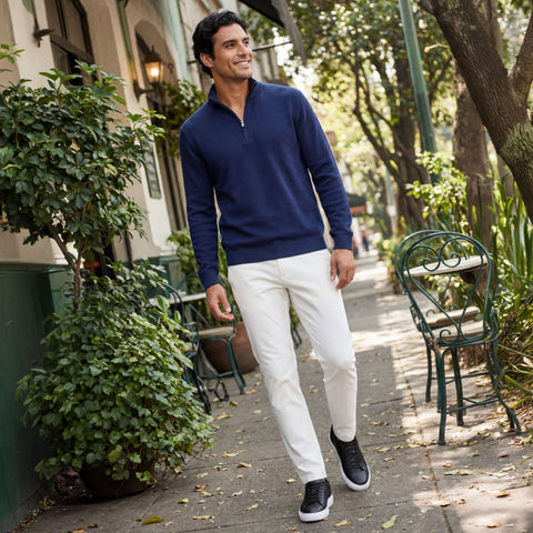 A man wearing the Jetsetter Tech Pant Slim Fit in True White