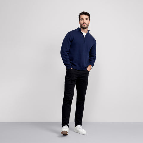 The Jetsetter Quarter-Zip Sweater in Navy worn by a model