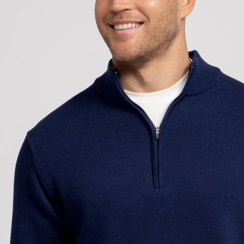The Jetsetter Quarter-Zip Sweater in Navy in a lifestyle shot