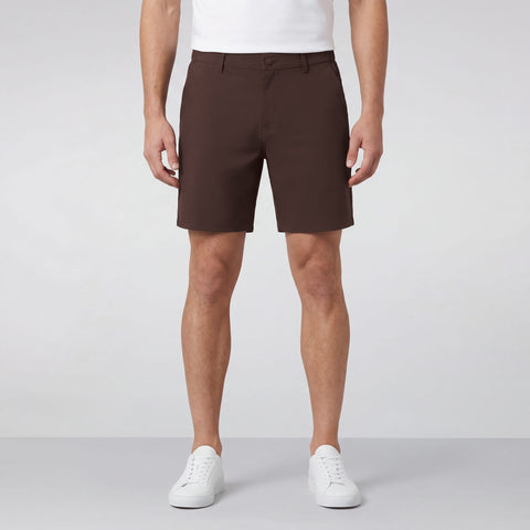 A man wearing the Jetsetter Tech Short 7 inches in Bourbon Brown