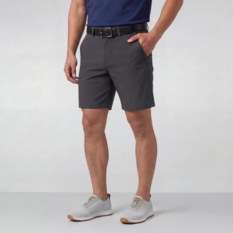 A man wearing the Jetsetter Tech Short 7" in Charcoal Gray