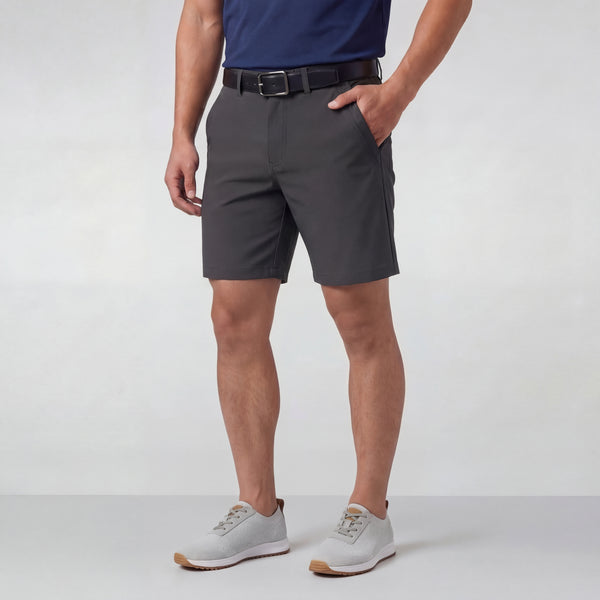 A man wearing the Jetsetter Tech Short 7" in Charcoal Gray