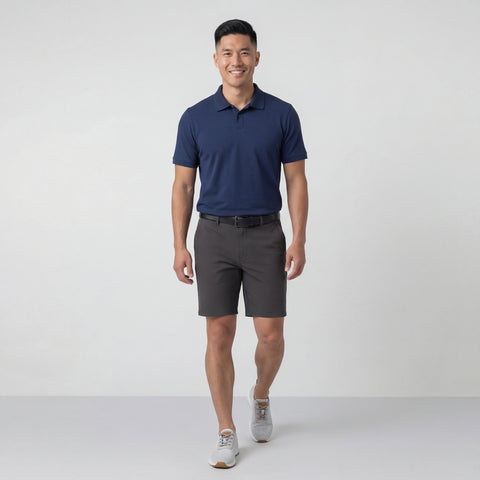 A man in the Jetsetter Tech Short 7 Charcoal Gray, side view.