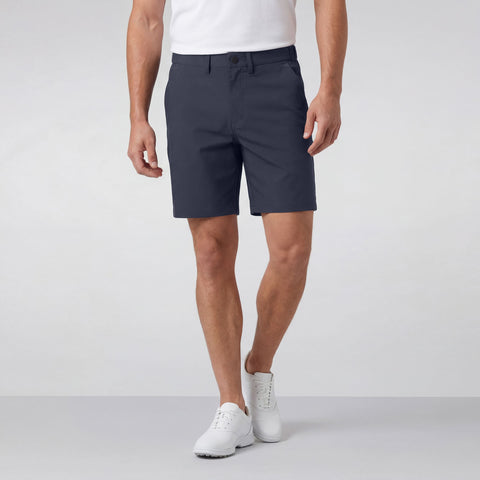 A man wearing the Jetsetter Tech Short 7" in Deep Blue