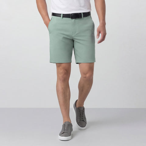 A man wearing the Jetsetter Tech Short 7" in Sage Green