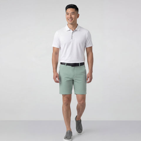 A man wearing the Jetsetter Tech Short 7 inch in Sage Green.