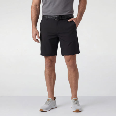 A man wearing the Jetsetter Tech Short 7 inches in True Black