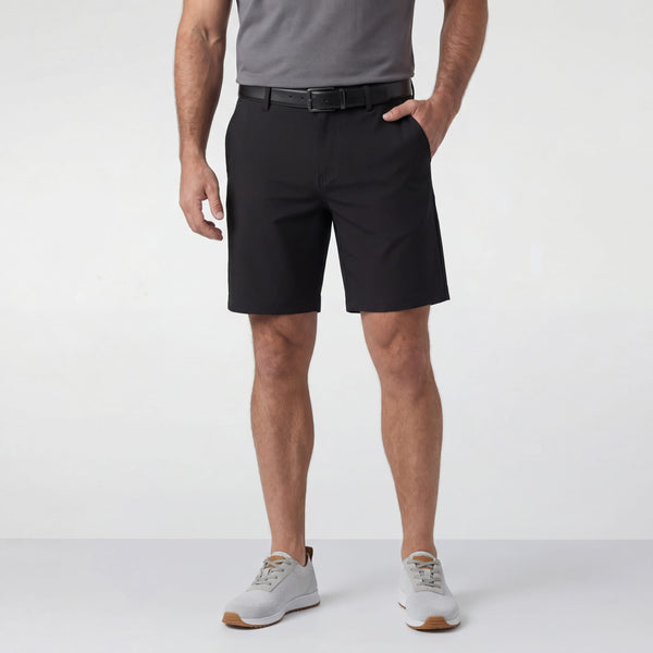 A man wearing the Jetsetter Tech Short 7 inches in True Black
