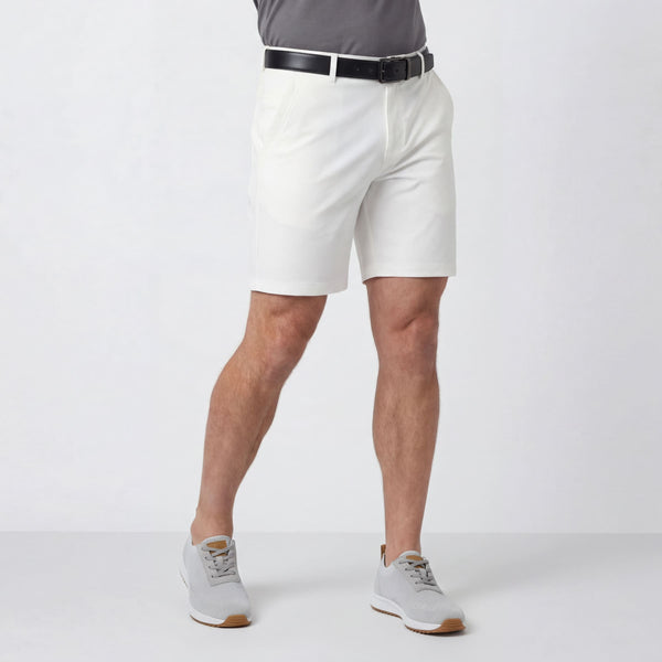 A man wearing the Jetsetter Tech Short 7" in True White