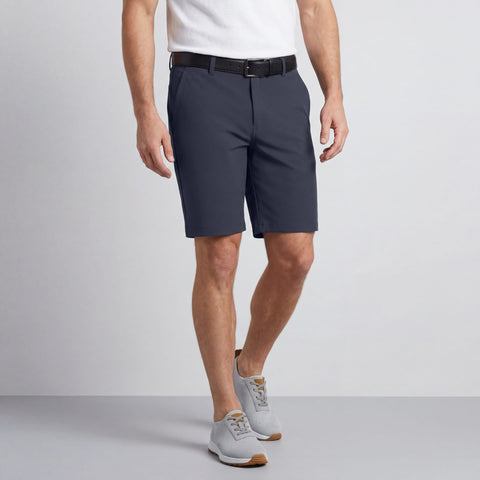 A man wearing the Jetsetter Tech Short 9 inches in Deep Blue