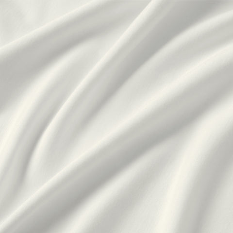 Close-up of smooth, white fabric with gentle folds and soft shadows—ideal for the Jack Archer Jetsetter Tee in Ecru, a crewneck designed to keep you travel-ready wherever you go.