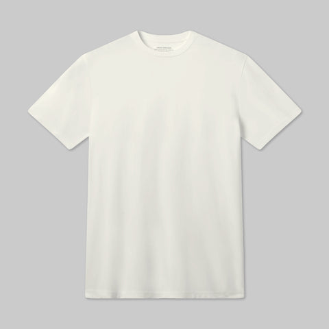 The Jack Archer Jetsetter Tee in Ecru is shown against a light gray background. This travel-ready short-sleeve tee features a classic crewneck and a clean, logo-free design for versatile, effortless style.